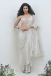 Buy_AMRTA by GUNEET KONDAL_Ivory Shell - Chiffon With Silver Yarn Embroidered Blouse Pre-stitched Saree _at_Aza_Fashions