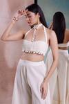 Shwetanga_Ivory Organic Cotton Halter Tie-up Scalloped Blouse And Frilled Hem Pant Set _Online_at_Aza_Fashions