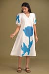 Shop_Trendy tokari_White Popylene Printed Tulip V Neck A-line Dress_Online_at_Aza_Fashions