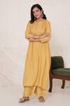 Buy_Nero India_Gold Silky Modal Embellished Pearls Round Pintucked Kurta And Wide Leg Pant Set _Online_at_Aza_Fashions