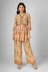 Buy_HOUSE OF SUPRIYA_Beige Silk Georgette Printed Ikat Notched Peplum Top And Pant Set _at_Aza_Fashions