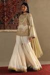 RI.Ritu Kumar_White Top- 100% Silk Embroidered Round Darpan And Sharara Set _at_Aza_Fashions