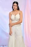 Alaya Advani_White Georgette Hand Embroidered Sequins Sweetheart Peplum Top Sharara Set _at_Aza_Fashions