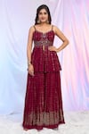 Alaya Advani_Maroon Peplum And Palazzo Faux Georgette Hand Embroidered Work Pleated Top Set _Online_at_Aza_Fashions