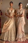 Ridhi Mehra_Gold Blouse Net Embellished Floral Plunge V Neck Swarn Bridal Lehenga Set _at_Aza_Fashions