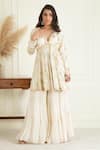 Shop_Priyanka Jain_Ivory Lurex Georgette Embroidery Sequin Plunge V Neck Peplum Kurta Sharara Set _Online_at_Aza_Fashions