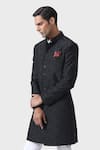 Shop_Raghavendra Rathore Jodhpur_Black Embroidery Timeless Elegance Refined Textured Achkan _Online_at_Aza_Fashions