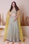 Buy_Surabhi Arya_Green Organza Tissue Embroidered Zardozi Plunge Placed Floral Lehenga Set_at_Aza_Fashions