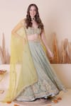 Shop_Surabhi Arya_Green Organza Tissue Embroidered Zardozi Plunge Placed Floral Lehenga Set_at_Aza_Fashions