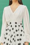 Samyukta Singhania_White Cotton Polka Dot Print Flared Dress_at_Aza_Fashions