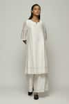 Buy_Abraham & Thakore_Ivory Chanderi Embroidered French Knot Notched Kurta  _at_Aza_Fashions