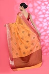 Shop_Nazaakat by Samara Singh_Orange Cotton Silk Woven Floral Dot Pattern Saree With Running Blouse Piece_at_Aza_Fashions