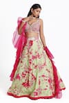 Buy_Nitisha Kashyap Official_Green Silk Hand Embroidered Tie-dye Leaf Neck Blouse Lehenga Set _at_Aza_Fashions