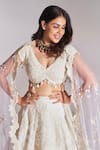 Shop_Osaa by Adarsh_White Organza Embroidered Floral Plunged V Bridal Lehenga Set  _at_Aza_Fashions