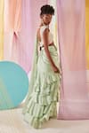 Shop_Anu Pellakuru_Green Raw Silk Embroidery Glass Pre-draped Ruffle Saree With Floral Blouse _Online_at_Aza_Fashions