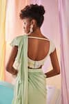 Anu Pellakuru_Green Raw Silk Embroidery Glass Pre-draped Ruffle Saree With Floral Blouse _at_Aza_Fashions