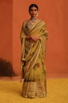 Buy_Archana Jaju_Yellow Kalamkari Hand Painted Geometric Floral Saree _at_Aza_Fashions