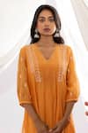 Buy_Pants and Pajamas_Orange Kurta Chanderi Mul Hand Embroidered Floral V Chikankari Work And Pant Set _Online_at_Aza_Fashions