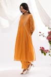 Buy_Pants and Pajamas_Orange Chanderi Mull Embroidered Chikankari V-neck Kurta _at_Aza_Fashions