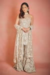 Buy_Seema Gujral_Beige Net Embroidery Thread Halter Floral Sheer Kurta Sharara Set  _at_Aza_Fashions