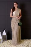 Buy_Surabhi Arya_Gold Saree Imported Shimmer Hand Embroidered Leaf Pre-draped With Blouse_at_Aza_Fashions