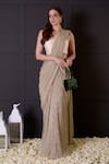 Buy_Surabhi Arya_Gold Saree Imported Shimmer Hand Pre-draped With Blouse _at_Aza_Fashions