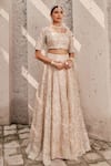 Nidhika Shekhar_Cream Satin Embroidered Crystal Maharani-e-khaas Floral Bridal Lehenga Set _Online_at_Aza_Fashions