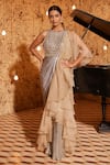 Buy_Nidhika Shekhar_Gold Lycra Embroidered Crystal Round Ujwal Sitaare Ruffle Draped Meramaid Gown _at_Aza_Fashions