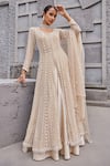 Nidhika Shekhar_Gold Net Suvarn Bela Maharani Floral Sequin Cape Lehenga Set _Online_at_Aza_Fashions