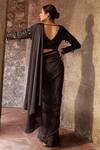 Shop_Nidhika Shekhar_Black Pleated Embroidered Jilmil Sitaare Textured Pre-draped Saree With Blouse _at_Aza_Fashions