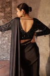 Nidhika Shekhar_Black Pleated Embroidered Jilmil Sitaare Textured Pre-draped Saree With Blouse _at_Aza_Fashions