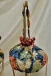 Buy_Ozel_Blue Sequin Kalamkari Print Gol Potli Bag _at_Aza_Fashions