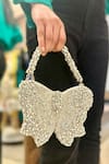 Shop_Ozel_Silver Rhinestone Bow Embellished Bag _at_Aza_Fashions