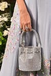 Ozel_Silver Hotfix Stones Shimmy Embellished Bucket Bag _at_Aza_Fashions