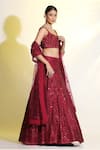 Shop_MeenaGurnam_Maroon Net Embroidered Cutdana Sweetheart Floral Sequin Lehenga Set _at_Aza_Fashions