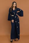 Buy_Aurouss_Blue Banana Crepe Embellished Stone Lapel Collar Overlap Panel Jumpsuit _at_Aza_Fashions