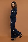 Shop_Aurouss_Blue Banana Crepe Embellished Stone Lapel Collar Overlap Panel Jumpsuit _Online_at_Aza_Fashions