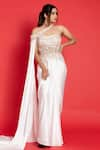 Buy_Aurouss_Ivory Silk Solid Pre-draped Saree Set With Sequin Embroidered Corset  _at_Aza_Fashions