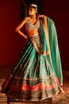 Buy_Aditi Gupta_Blue Lehenga Paithani Silk Woven Florette Cutwork V Neck Bridal Set _at_Aza_Fashions