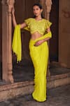 Buy_DiyaRajvvir_Yellow Tulle Embroidery Sequins Floral Jaal Blouse With Pre-draped Skirt Saree _at_Aza_Fashions