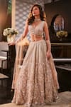Buy_Kalighata_Peach Organza Hand Embroidered Floral Plunged Sparkle Lehenga Set _at_Aza_Fashions
