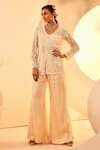 Buy_Aneesh Agarwaal_Ivory Satin Embroidery Pearls Ethereal Bloom Jacket Flared Pant Set _at_Aza_Fashions