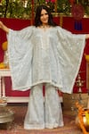 NIMA FASHIONS_Blue Net Hand Embroidered Sequins Notched Kaftan And Bell Bottom Set _Online_at_Aza_Fashions