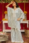 Buy_NIMA FASHIONS_Blue Net Hand Embroidered Sequins Notched Kaftan And Bell Bottom Set _Online_at_Aza_Fashions