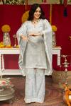 Buy_NIMA FASHIONS_Blue Net Hand Embroidered Sequins Notched Kaftan And Bell Bottom Set 