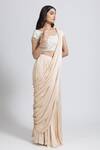 NIMA FASHIONS_Cream Saree Satin Hand Embroidered Sequins Round Pre-draped With Blouse _Online_at_Aza_Fashions