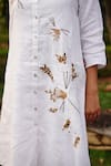 Shop_Linen Bloom_White 100% Linen Embroidered Floral Round Tunic_at_Aza_Fashions