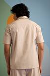 Shop_Muvazo_Beige Cotton Sunbeam Half Zip Tee _at_Aza_Fashions