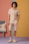 Shop_Muvazo_Peach Jacquard Sunlit Sienna Woven Zip Tee _at_Aza_Fashions