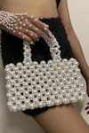 Buy_RUBILON_White Faux Pearl Venus Woven Bag _at_Aza_Fashions